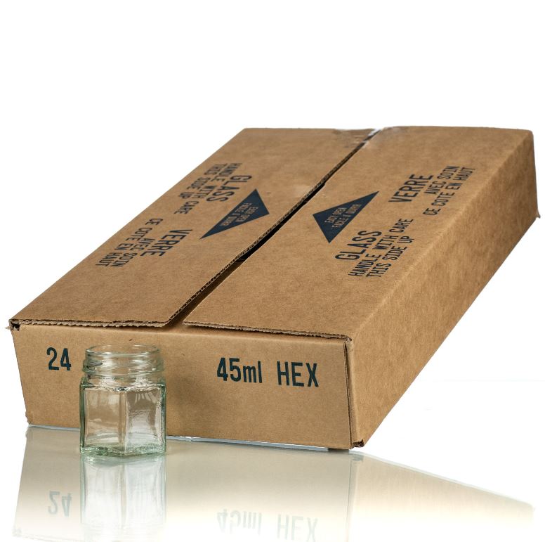 Clear 45mL glass hexagonal jar in front of a cardboard box containing a case of 24 on a white background