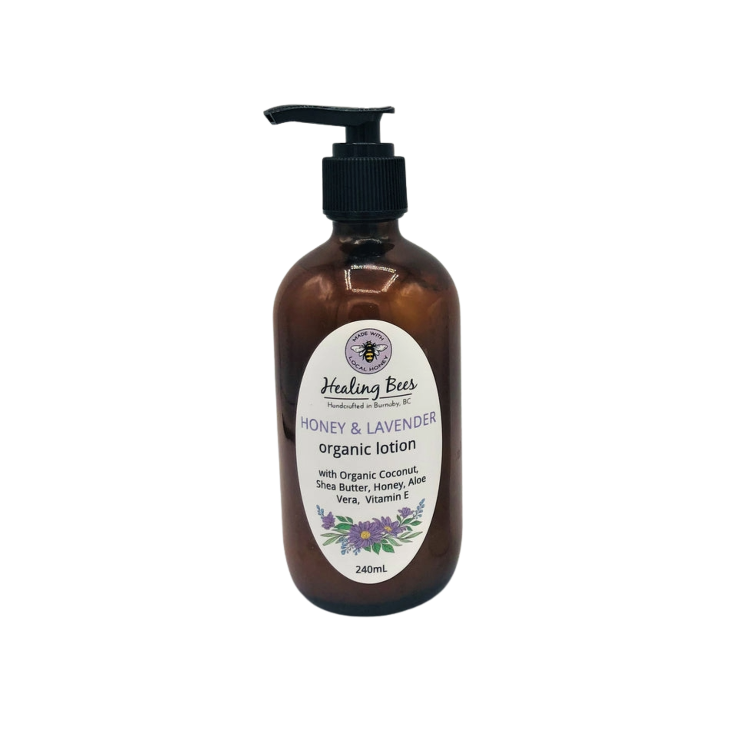 Brown bottle of Healing Bees Honey & Lavender organic lotion on a light gray background