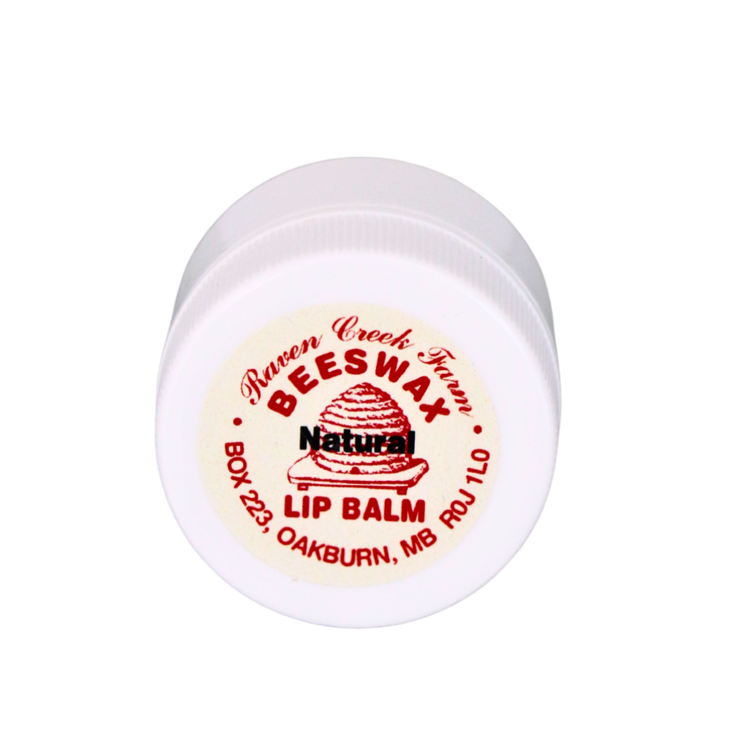 A white, plastic lip balm jar filled with Raven Creek Farm's Beeswax Lip Balm, flavoured as