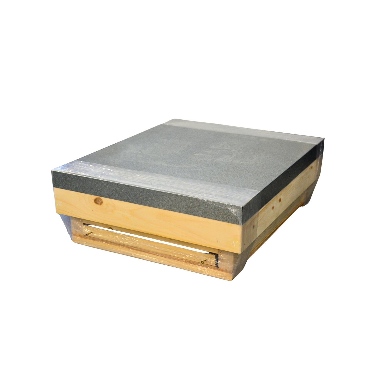 A square wooden box with a metal top surface, wrapped in protective plastic, set against a plain white background.