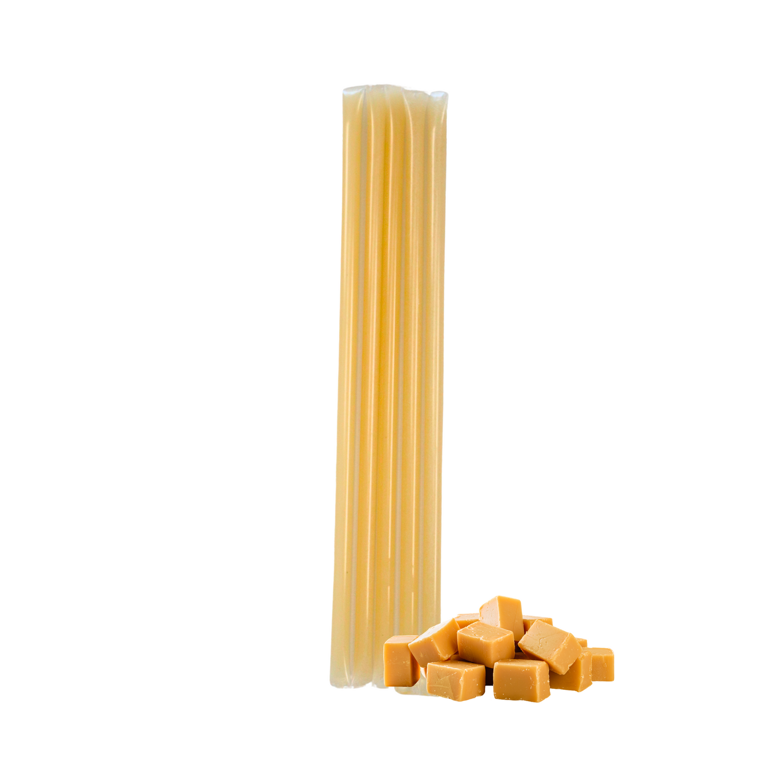 Five caramel creamed honey stixs standing upright beside a small cluster of caramel squares on a white background.