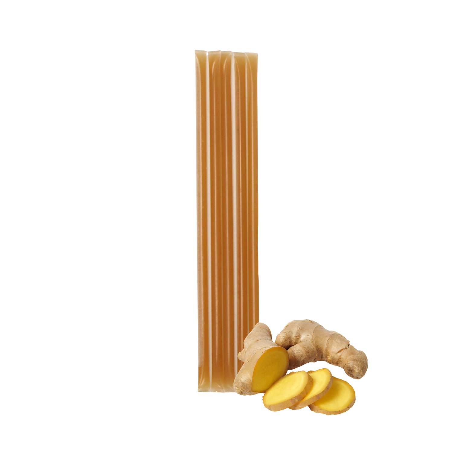 Five ginger creamed honey stixs standing upright beside a small cluster of ginger pieces on a white background.