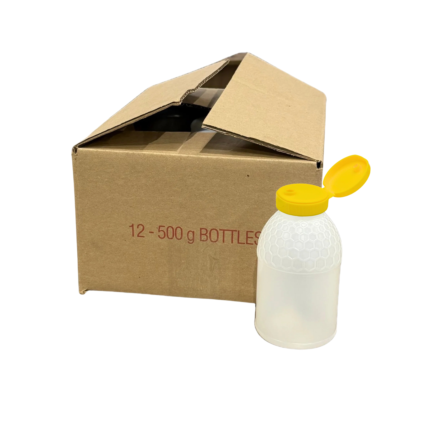 A clear plastic bottle with a yellow flip-top cap stands in front of an open brown cardboard box printed with '12 - 500 g BOTTLES' in red text, on a white background.