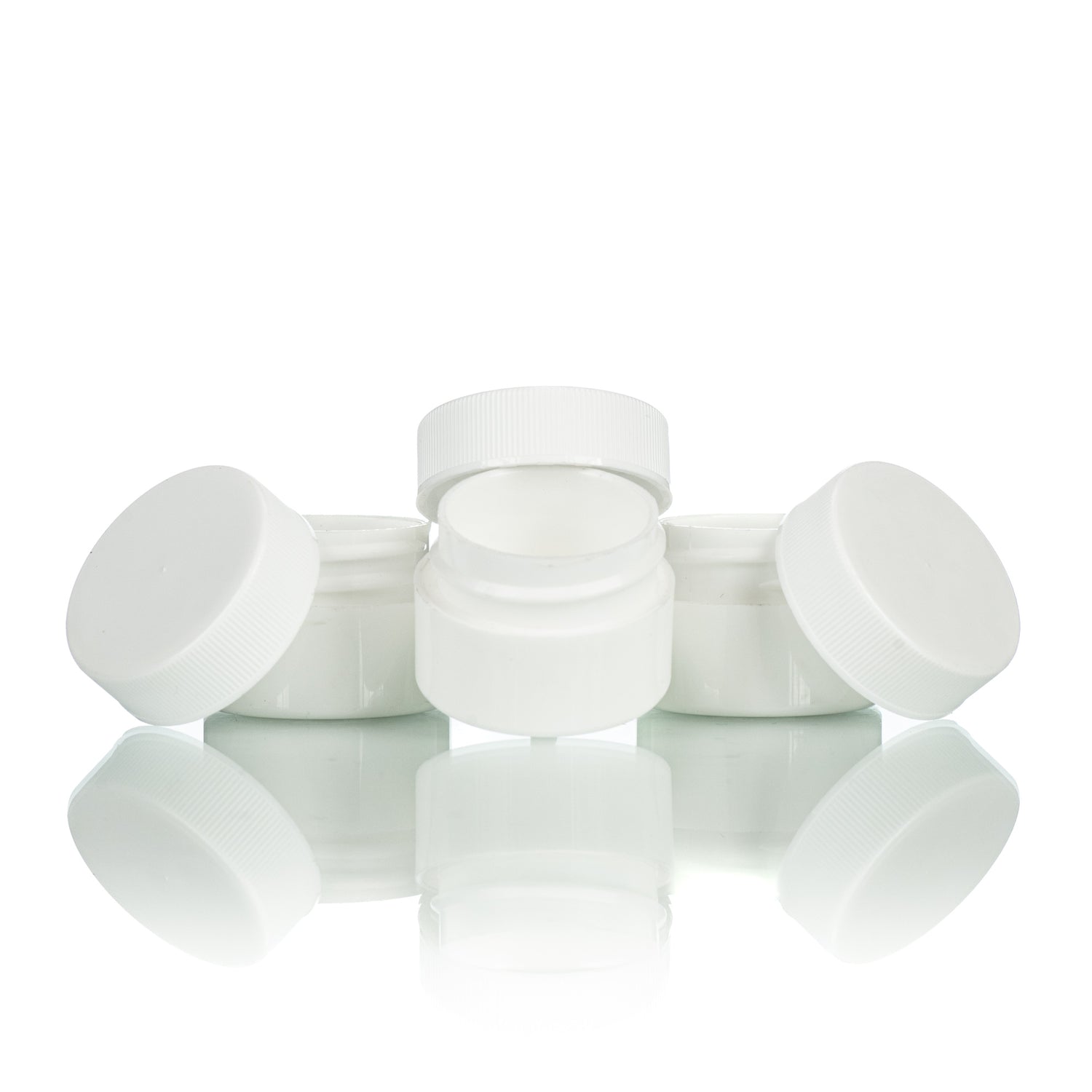 Three white lip balm jars with twist-top lids, displayed on a white background