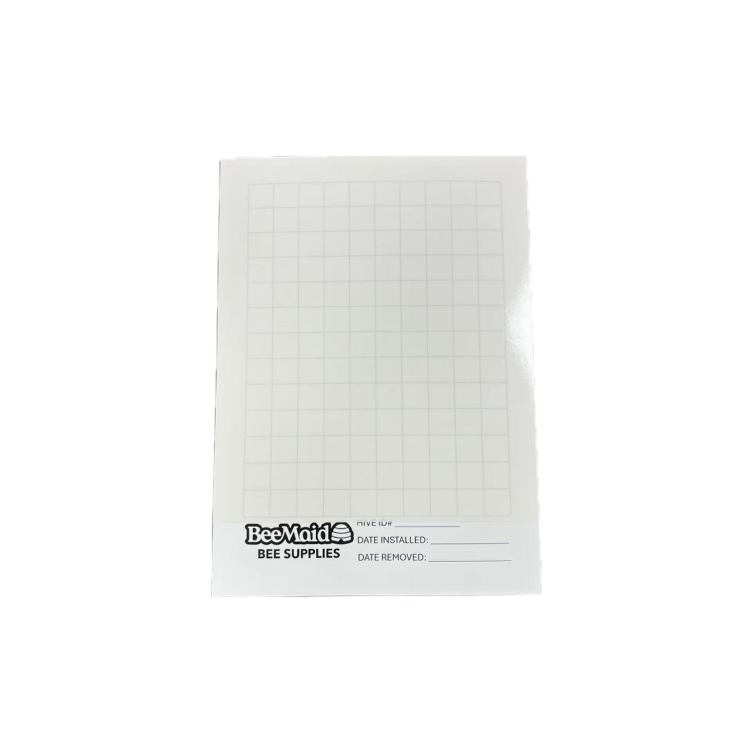 A white sticky board with a grid pattern, designed for monitoring Varroa mite infestation in beekeeping.