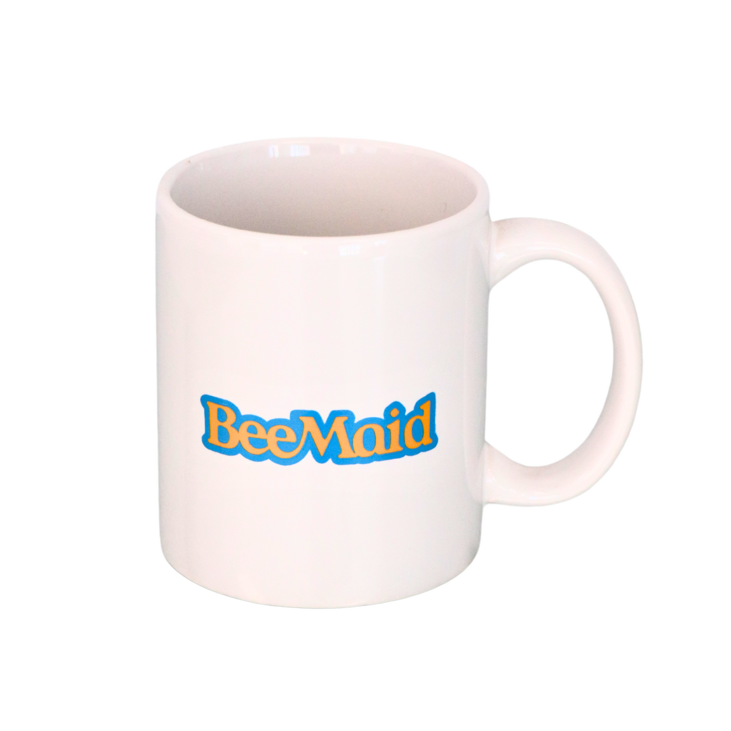 White ceramic mug with the word