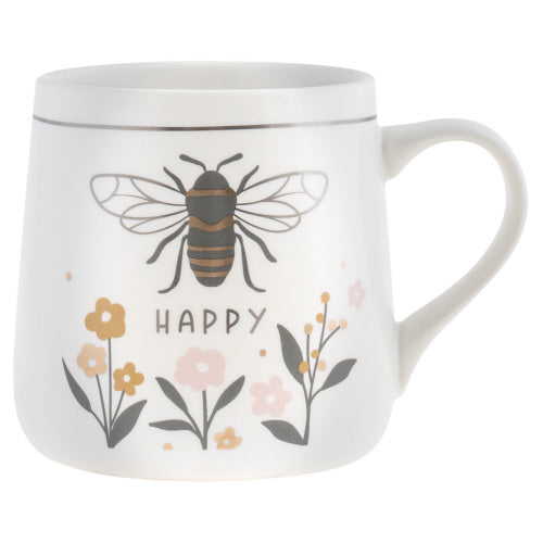 A white bone china mug with a bee illustration and the word 'HAPPY' below it, surrounded by floral designs on a white background