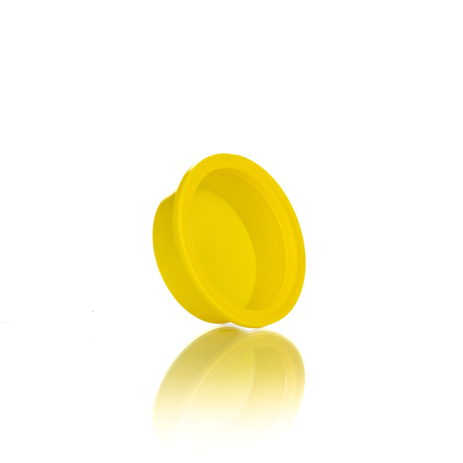 A side view of a single yellow plastic plug designed for use in beekeeping.