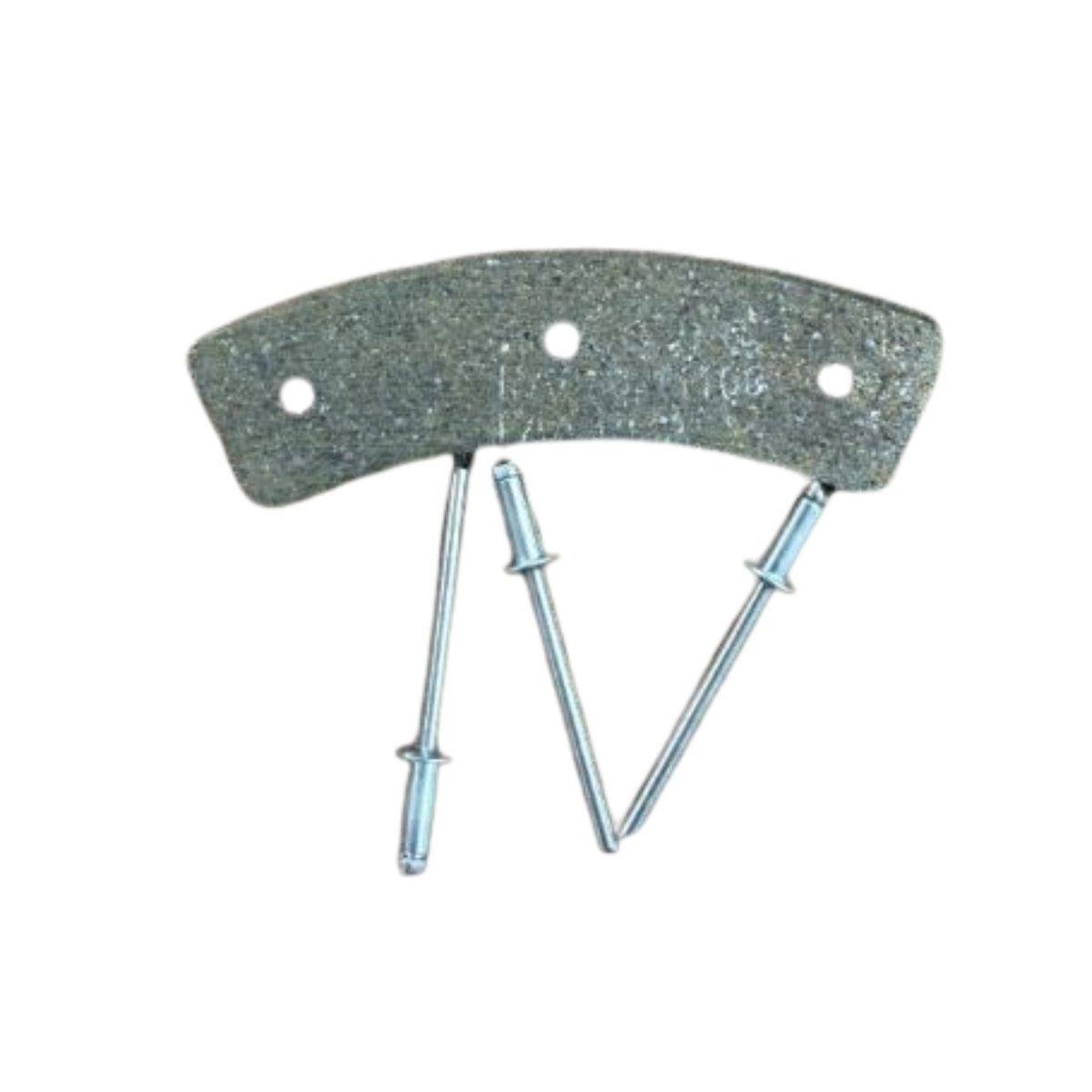 Brake pad with three metal rivets on a wooden surface