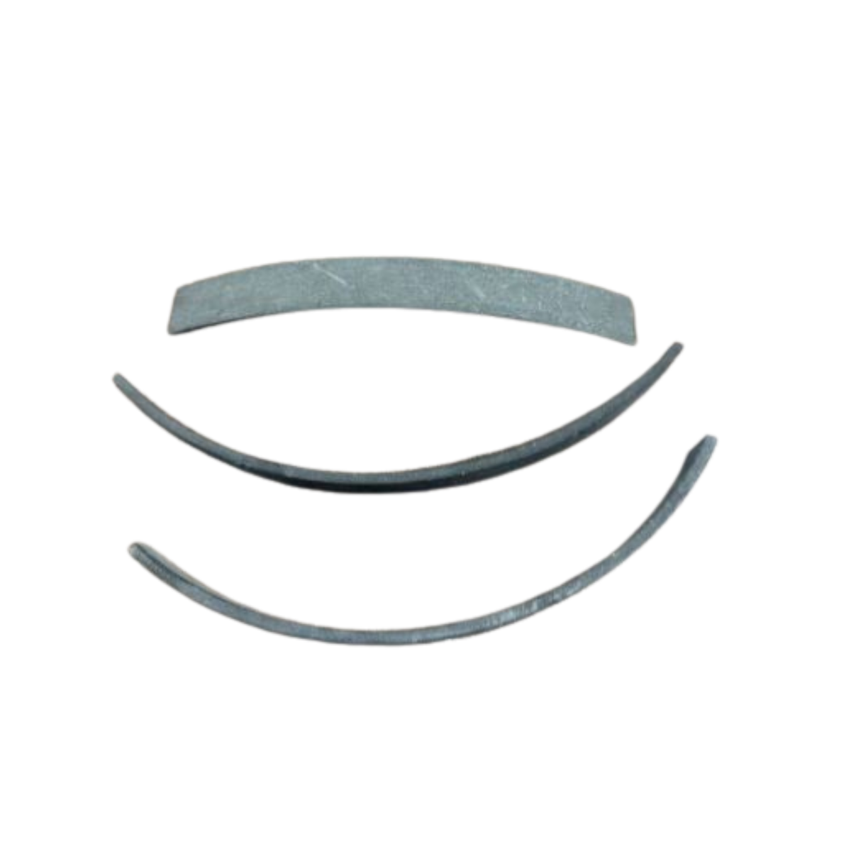 Three metal brake bands on a white surface