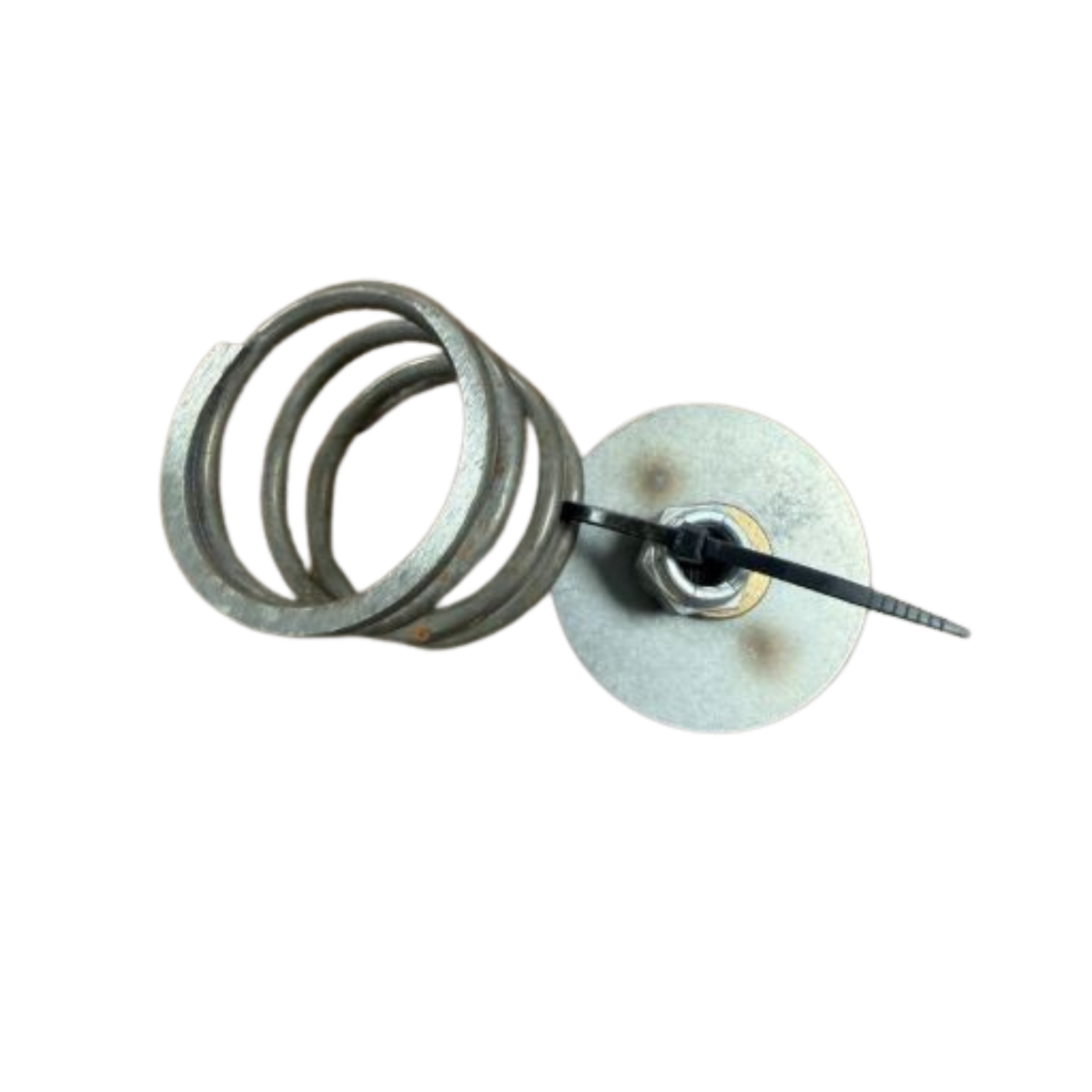 Metal heating element on a white surface