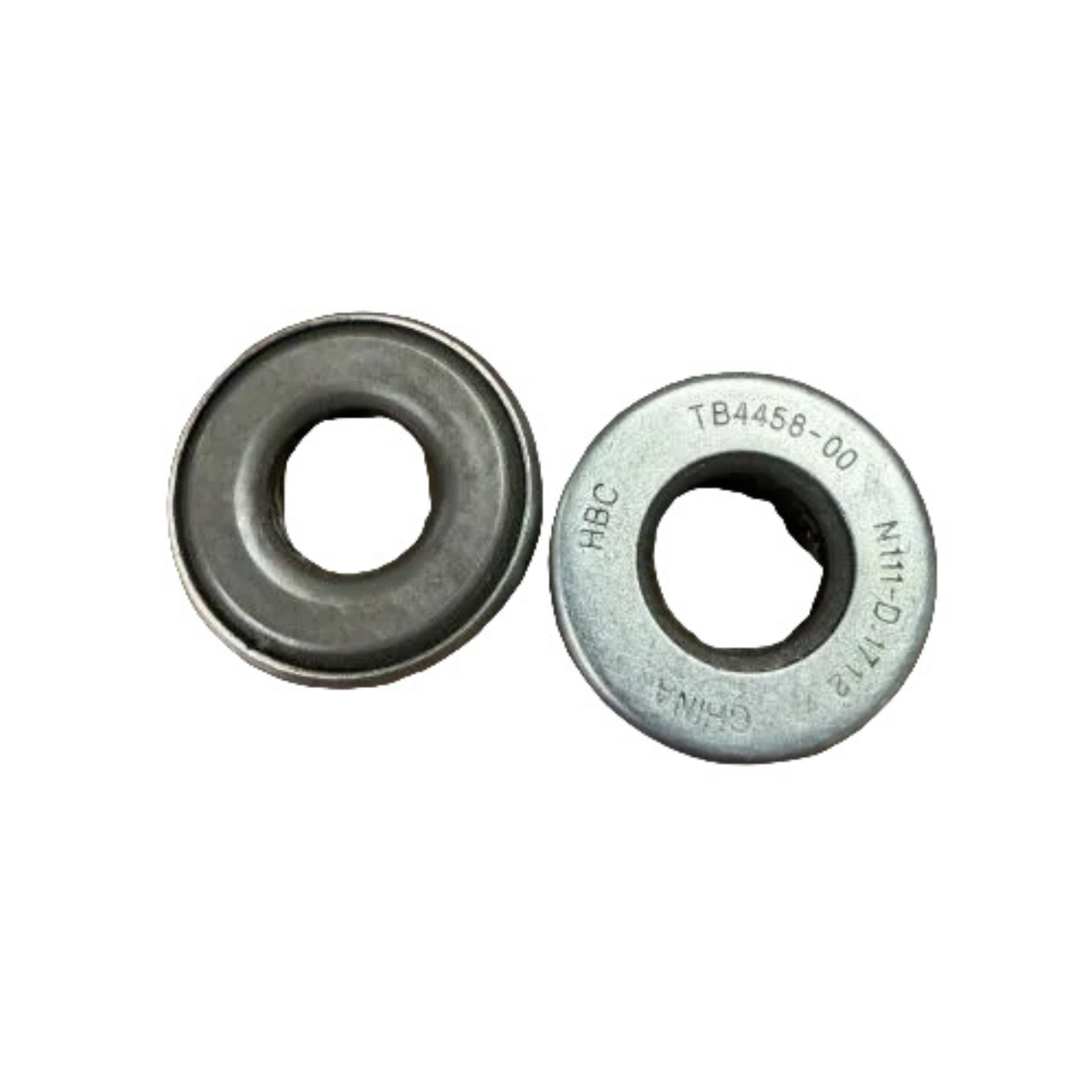 Two metal washers with text and markings on a white background