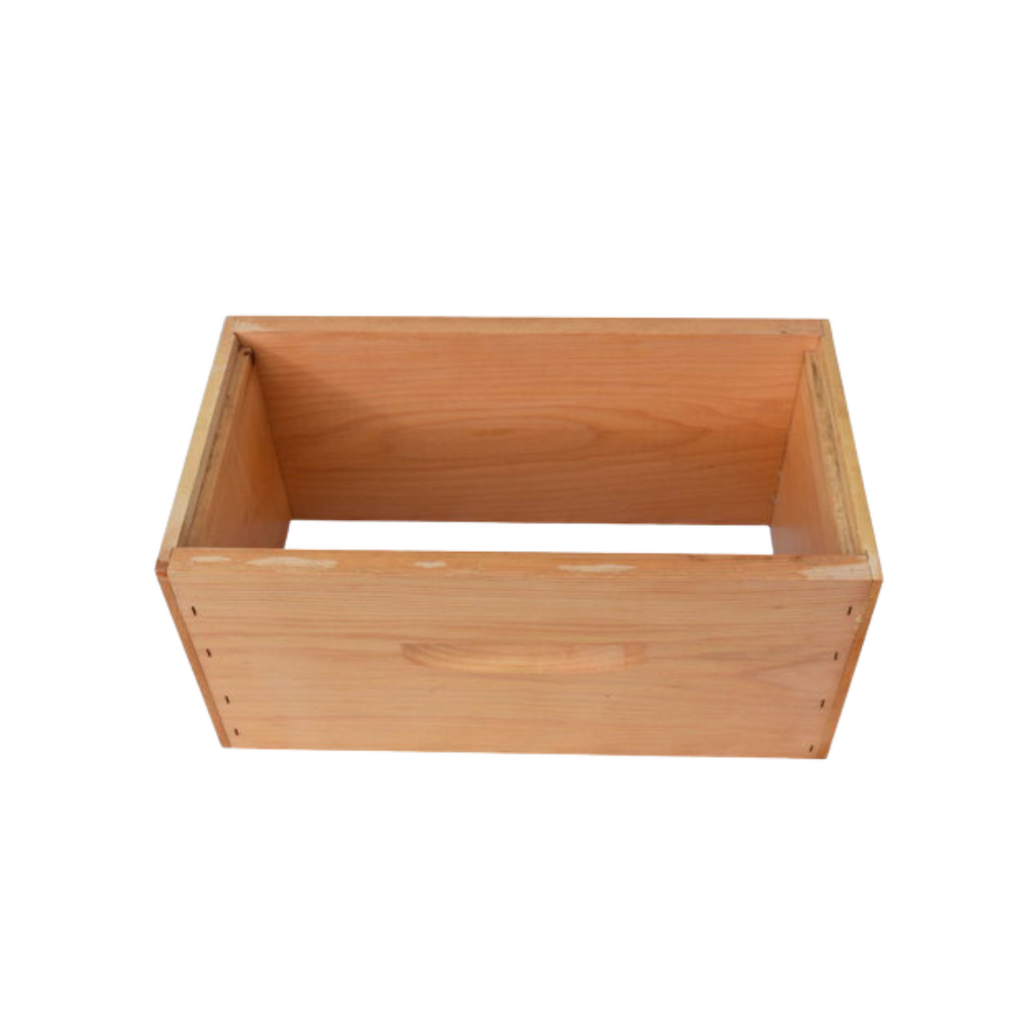 Wooden, assembled, and dipped 6-frame nuc box on a white background