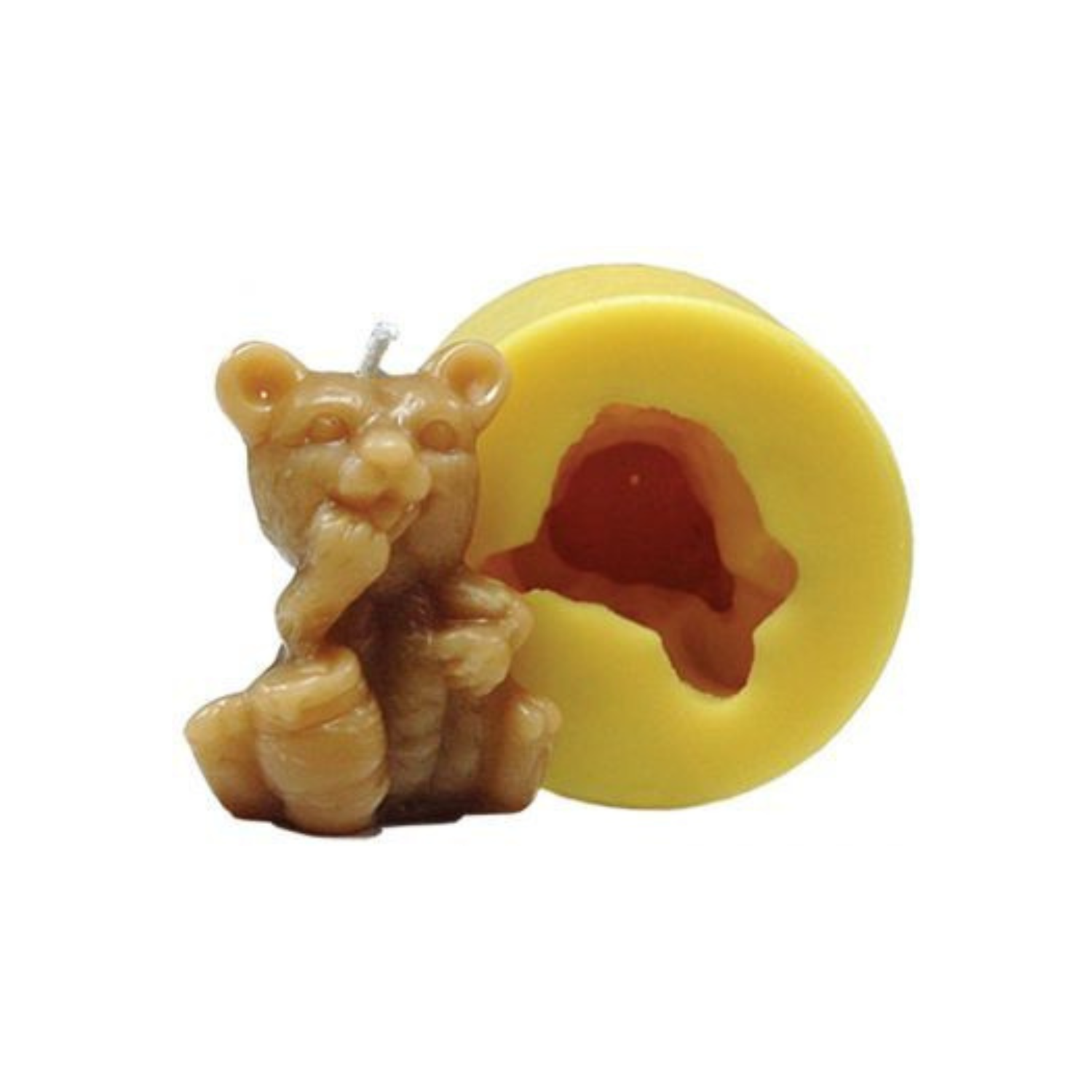 Bear candle and its corresponding silicone mold on a white background