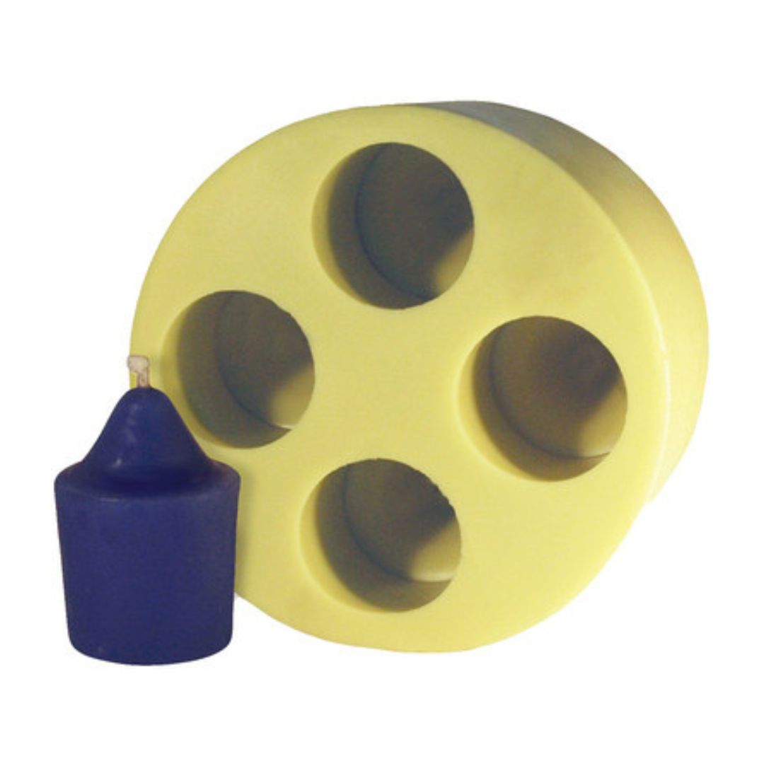 A yellow Votives candle mold with 4 circular holes and a blue cylindrical candle with a pointed top on a white background