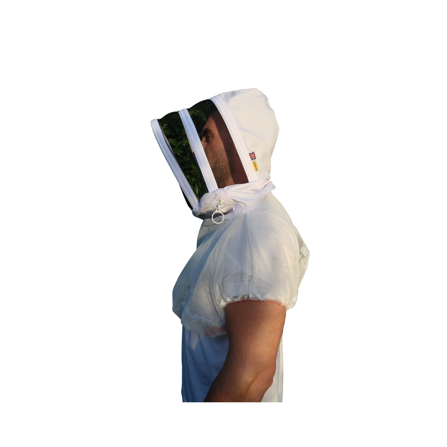 A side profile of a person wearing a white beekeeping suit with a mesh face veil and short sleeves, set against a solid white background.