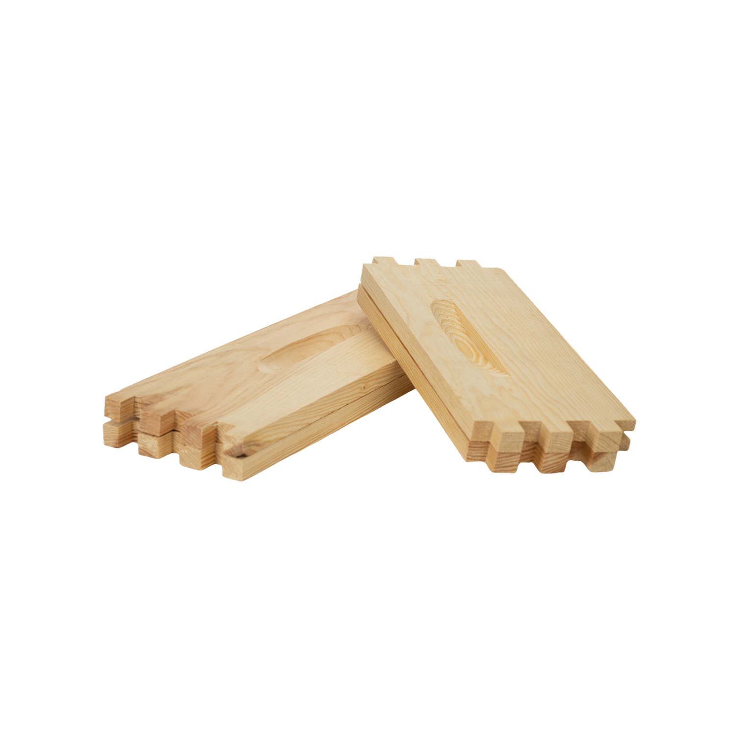Four components of an unassembled wooden honey super on a white background