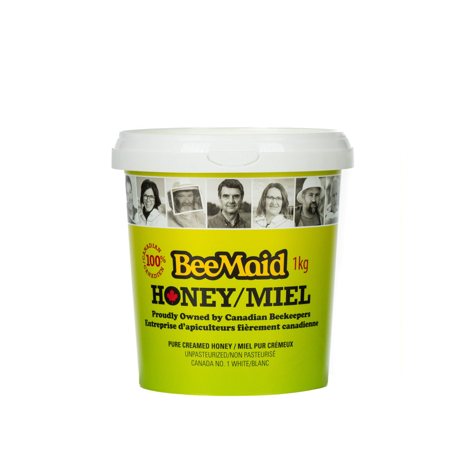 1-kilogram green plastic tub of BeeMaid creamed honey, with branding visible on a white background.