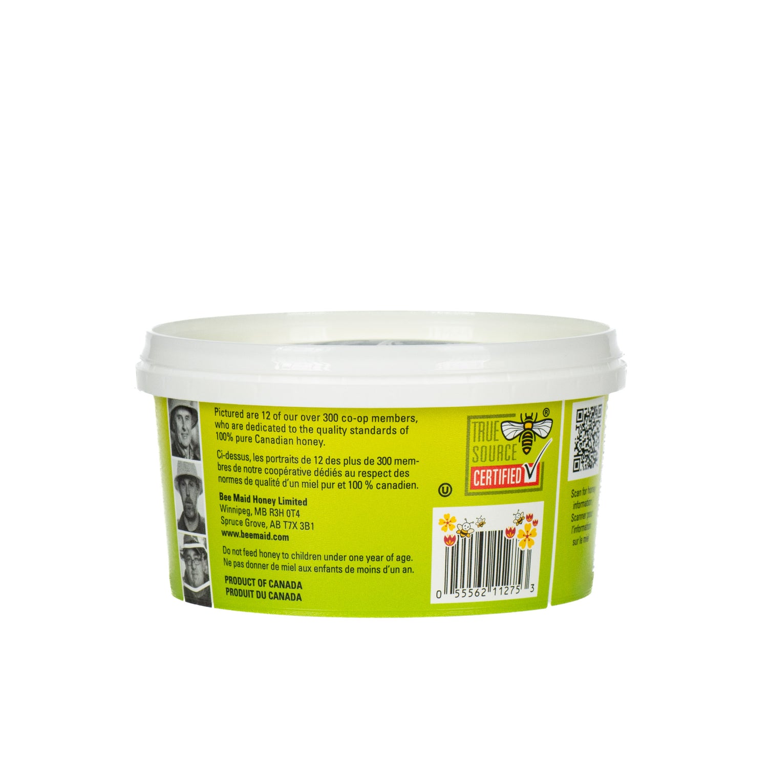 A 500-gram plastic green tub of BeeMaid creamed honey on a white background.