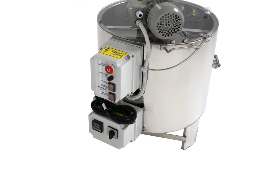 A close up of a large, industrial Konigin honey creamer and homogenizer with a capacity of 26 gallons, emphasizing the various operational controls on a white background