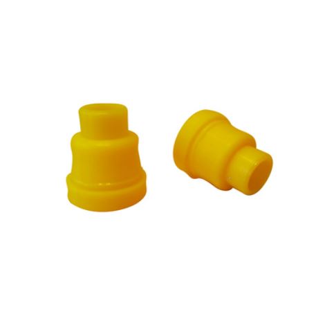 Two yellow plastic cup holders designed for a Jenter Queen Rearing Kit.
