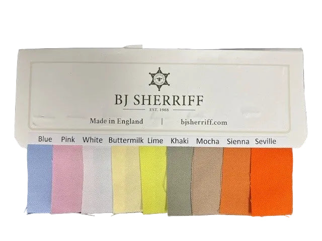 BJ Sherriff fabric swatch book with color samples on a white background
