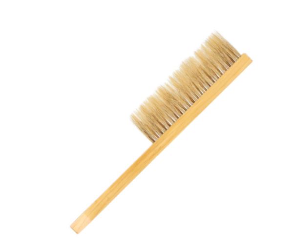 Wooden brush with bristle head on a white background