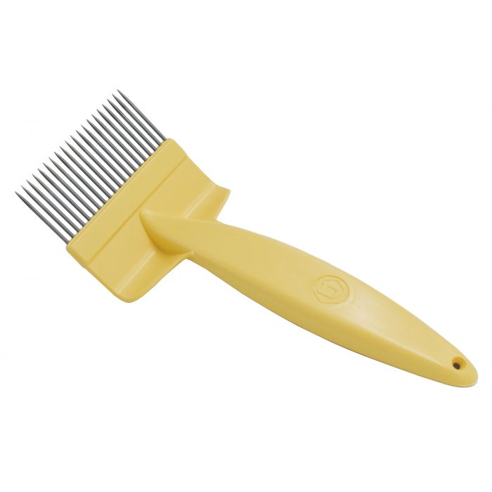 A yellow plastic capping scratcher with metal tines, used for uncapping honeycomb.