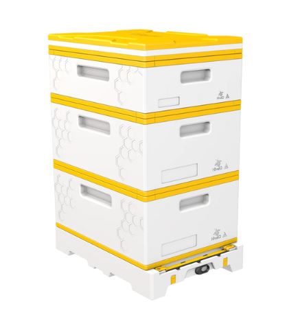 An example of the assembled three-storey HiveIQ beehive kit with white bodies and yellow details.