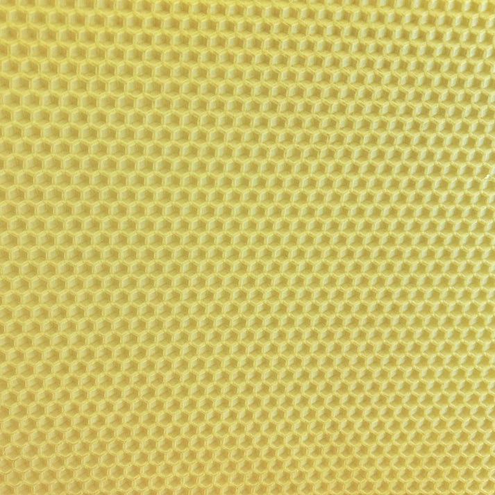 A close up of a natural coloured beeswax craft sheet