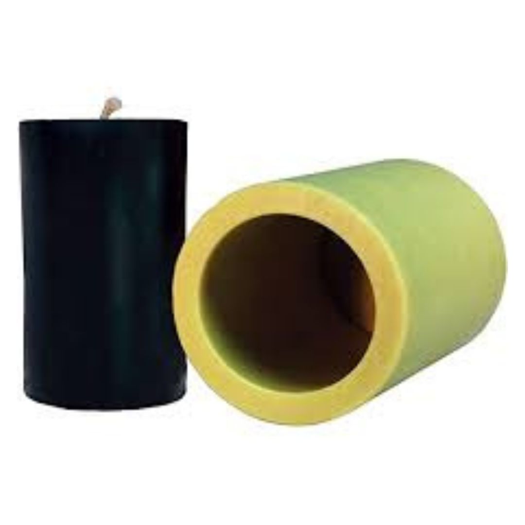 A cylindrical candle mold alongside a 3-inch by 6-inch candle that was made using the mold, displayed against a white background.
