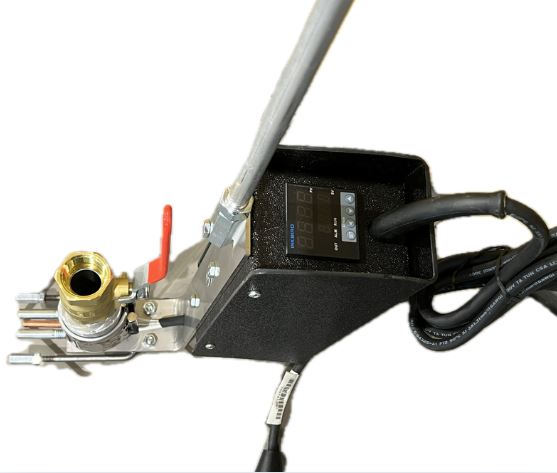 A close up of the control switches of a specialized oxalic acid applicator device.