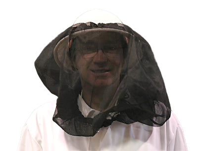 A person wearing a white helmet and a black tulle veil that fits securely on the helmet with an elasticized top and a long drawstring on a white background