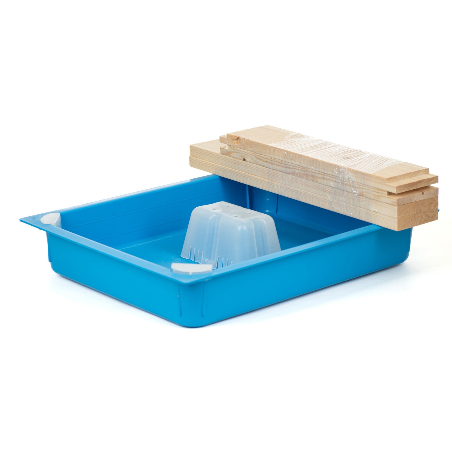 A blue top feeder with a patented corner access system, accompanied by corner caps and a chimney, displayed alongside a wooden frame.