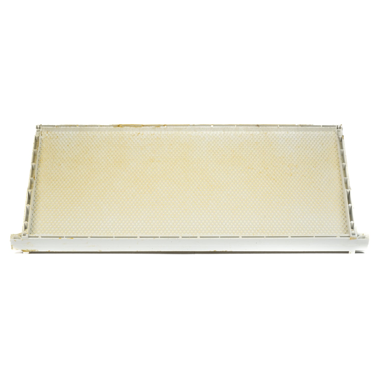 A white wax-coated plastic frame and foundation for beekeeping, designed to fit into Langstroth supers.