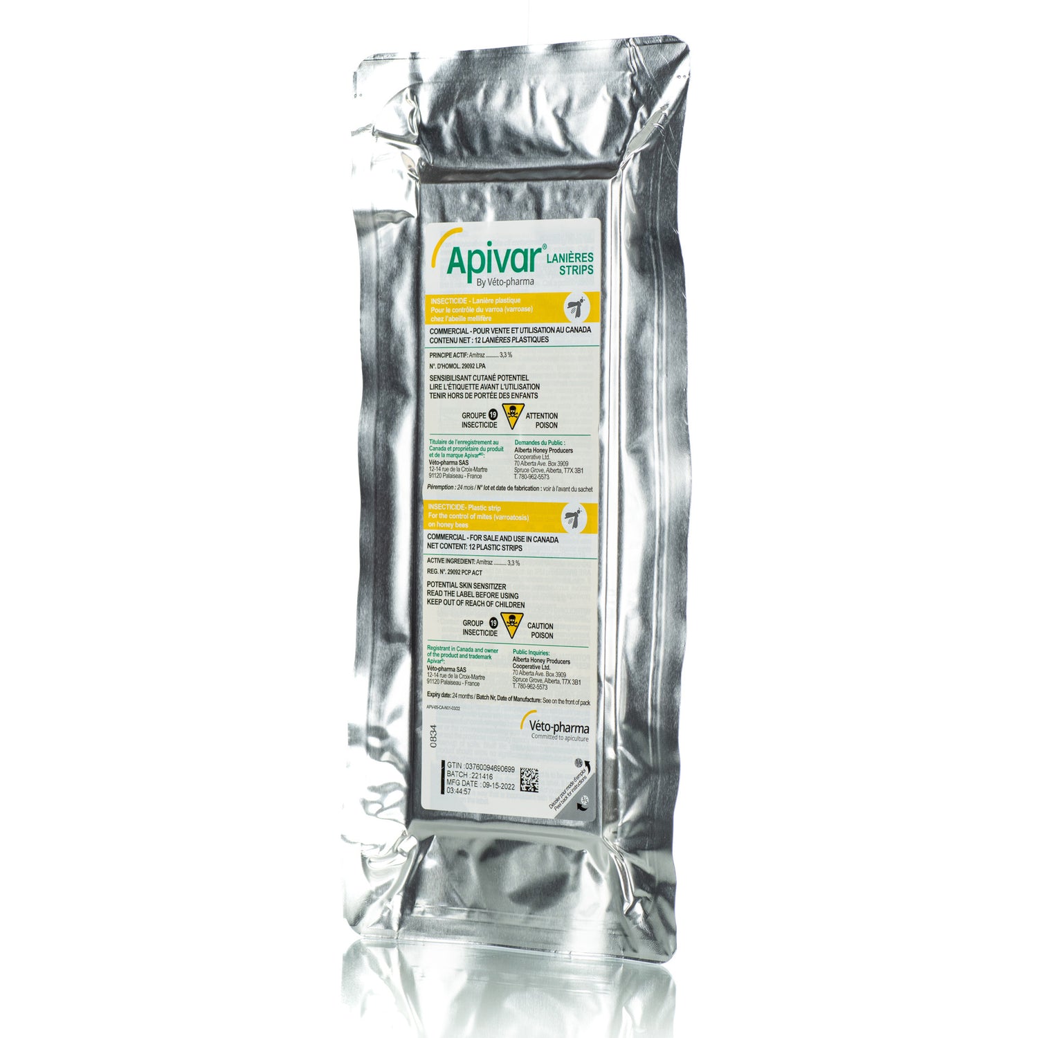 A side view of a sealed package of Apivar strips used for mite control in honey bees.