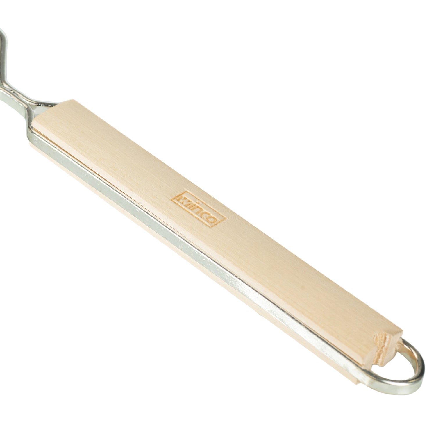 A close up of a metal honey strainer's wooden handle