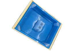 A blue plastic top feeder, designed to be compatible with HiveIQ beehive setups on a white background