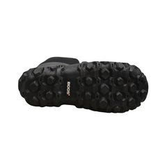The sole of a BOGS boot on a white background