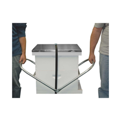 Two people lifting a hive with a hive carrier on a white background