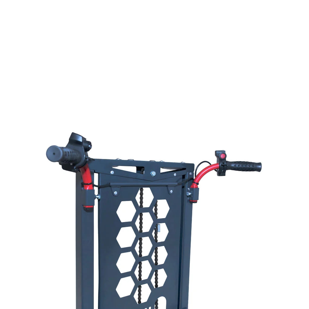 A Konigin industrial pallet jack with a dark gray steel frame, black wheels, and red accents on a white background