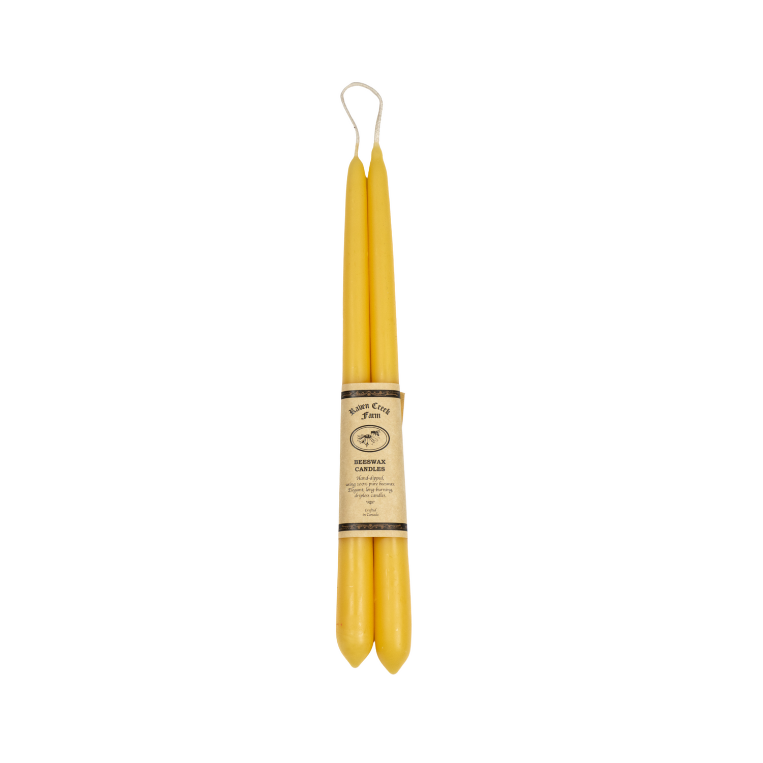 A pair of natural, hand-dipped candles on a white background