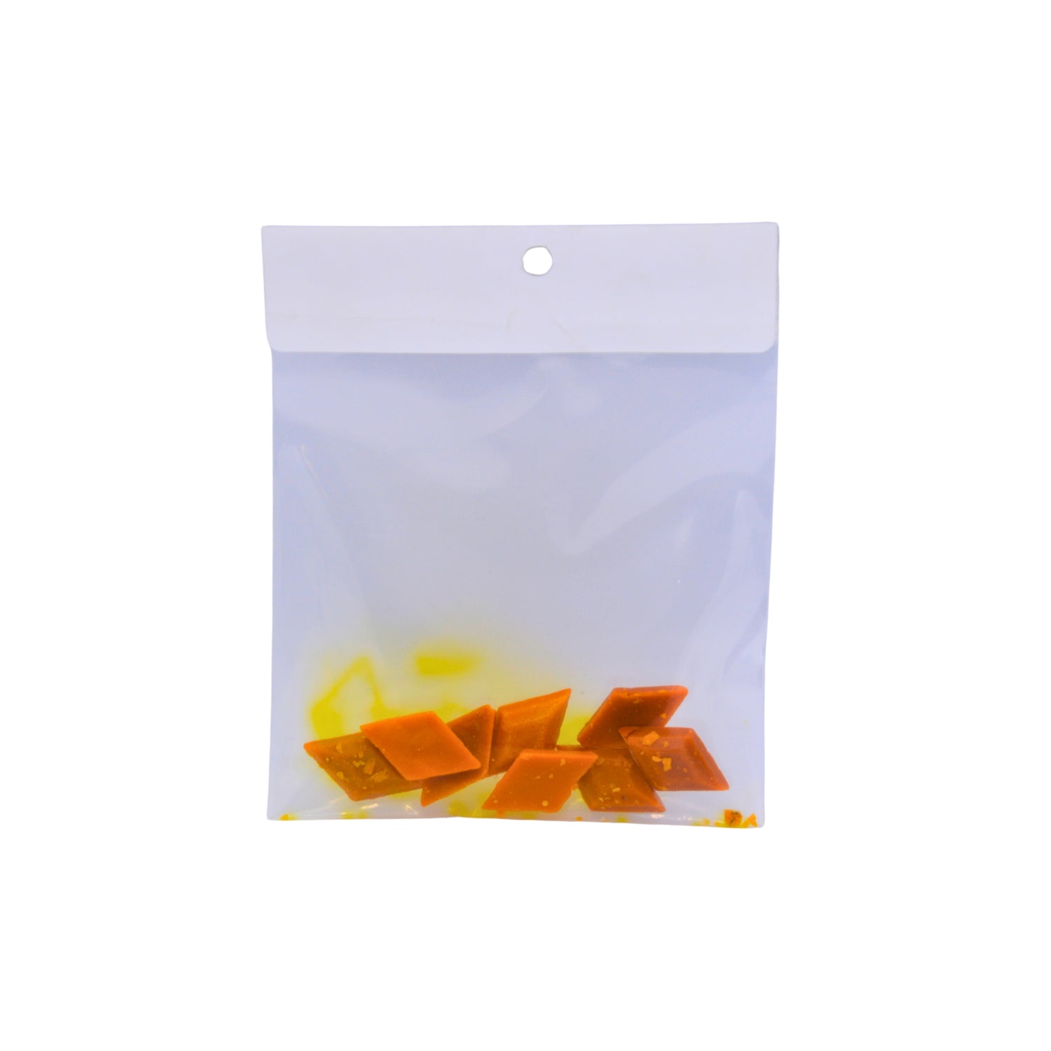 A clear plastic bag with several yellow coloured dye buds shown on a plain white background.
