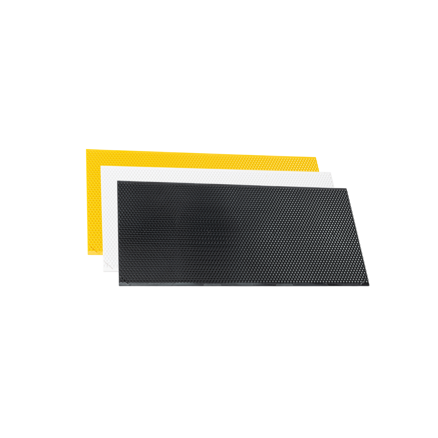 Three plastic and waxed foundations with different colors on a white background