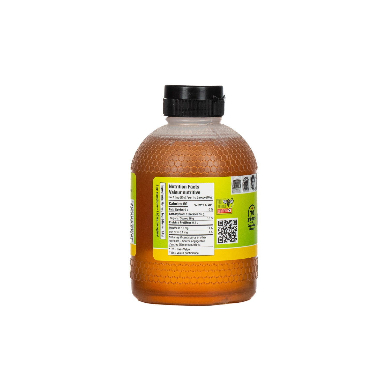 Bottle of honey with a label on a white background