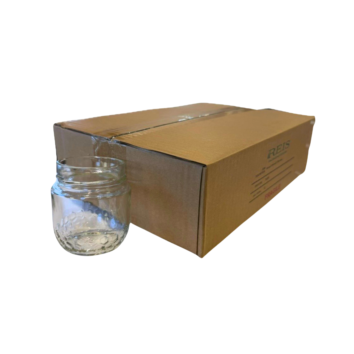 Clear glass jar next to a cardboard box with 'REIS' branding on a white background
