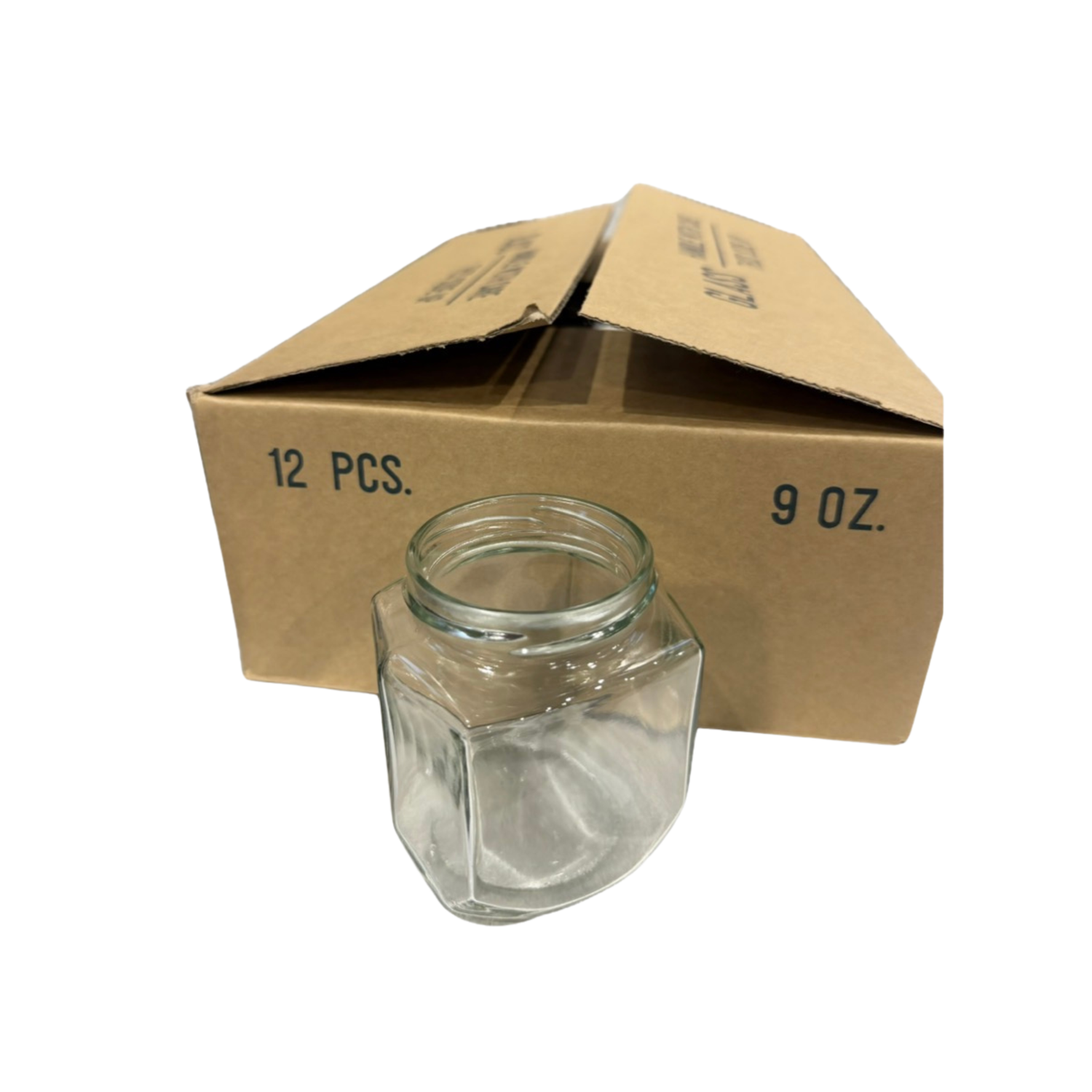 Clear glass hexagonal jar with a cardboard box labeled '12 PCS.' and '9 OZ.'