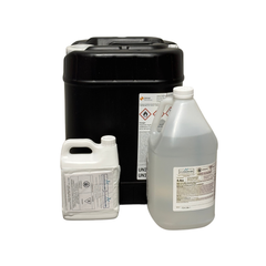 Collection of various containers of formic acid with labels on a white background