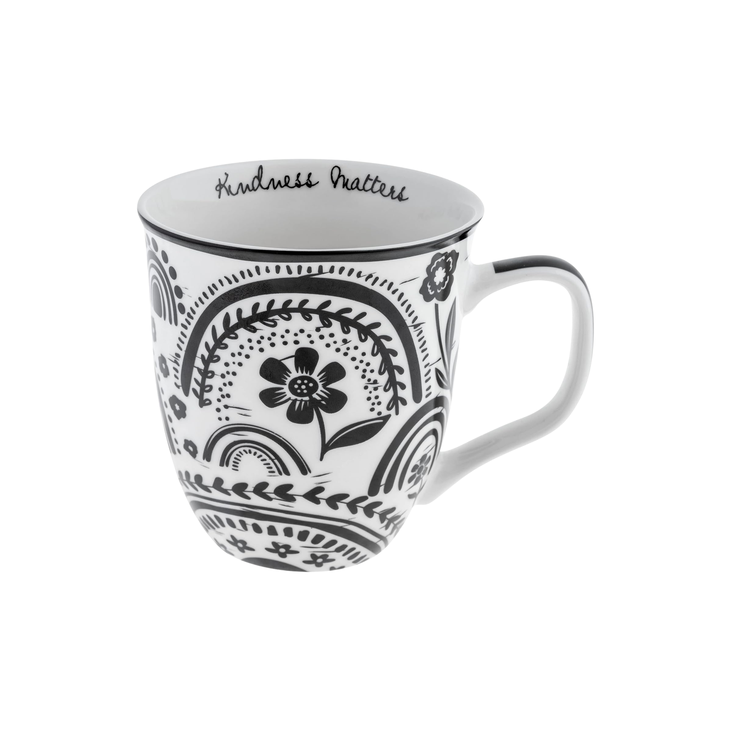 White mug with black floral patterns and 'Kindness Matters' text on a white background