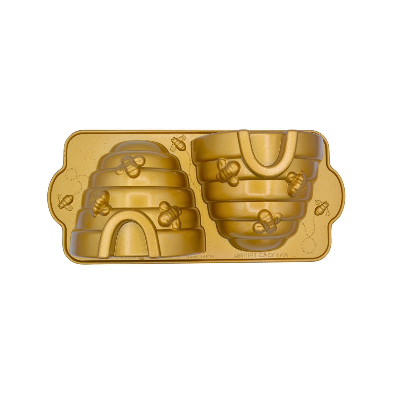 A gold-colored metal baking mold with two beehive-shaped cavities, decorated with embossed bees and honeycomb patterns, shown on a plain white background.